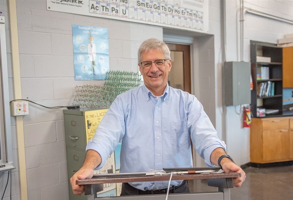 Science Department Chair Marcus McKinley, in his 36th year at Fenwick, often can be seen driving a yellow school bus.